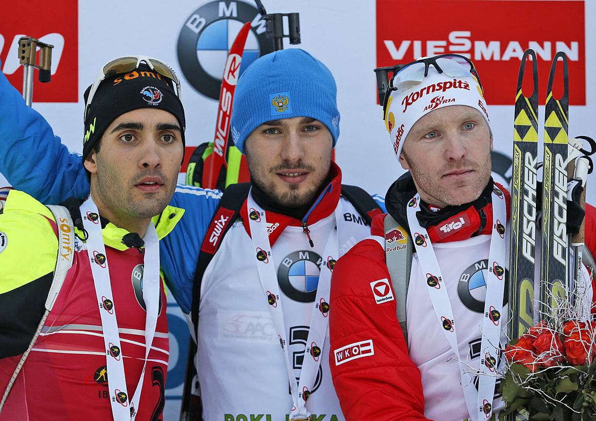 Russia's Anton Shipulin, center, celebrates his victory with фото (photo)