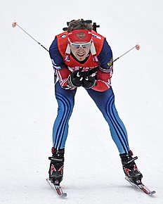 Биатлон Third placed Timofey Lapshin of Russia skis during the men& фото (photo)