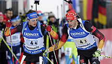 Germany's Arnd Peiffer, right, hands over to teammate Simon Schempp during the men's 4x7.5 km relay at the Biathlon World Cup in Ruhpolding, Germany, Thursday,...