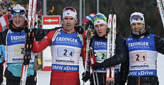 Norway's Johannes Thingnes Boe, from left, Emil Hegle Svendsen, Erlend Bjoentegaard and Ole Einar Bjoerndalen pose after winning the men's 4x7.5 km relay...