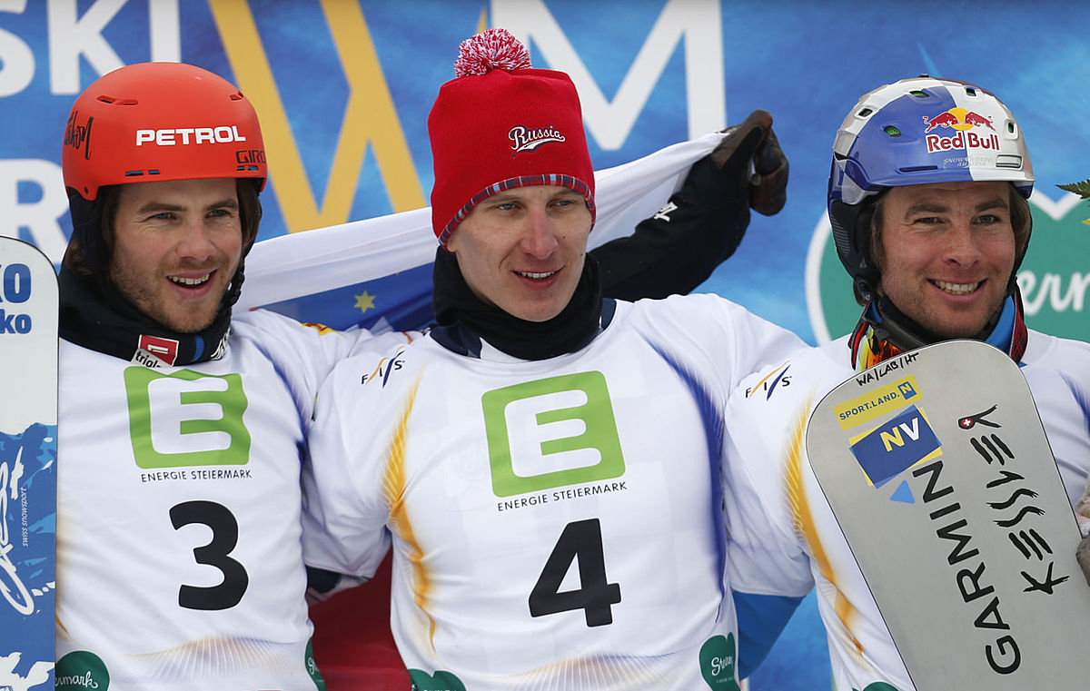 Snowboard (сноуборд): Russia's Andrey Sobolev, center, celebrates фото (photo)