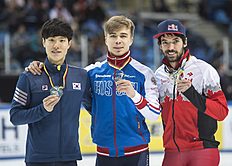 Конькобежный спорт Winner Semen Elistratov of Russia, center, celebrates beside фото (photo)