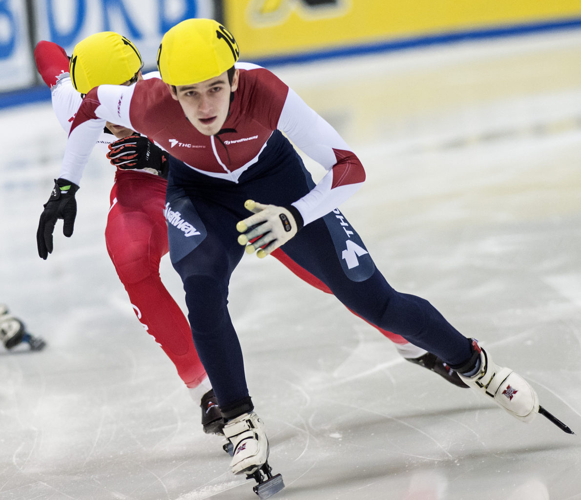 Winner Dmitry Migunov of Russia skates during the men's 500 фото (photo)