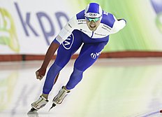 Конькобежный спорт Denis Yuskov, of Russia, skates to third place in the 5000 meter фото (photo)