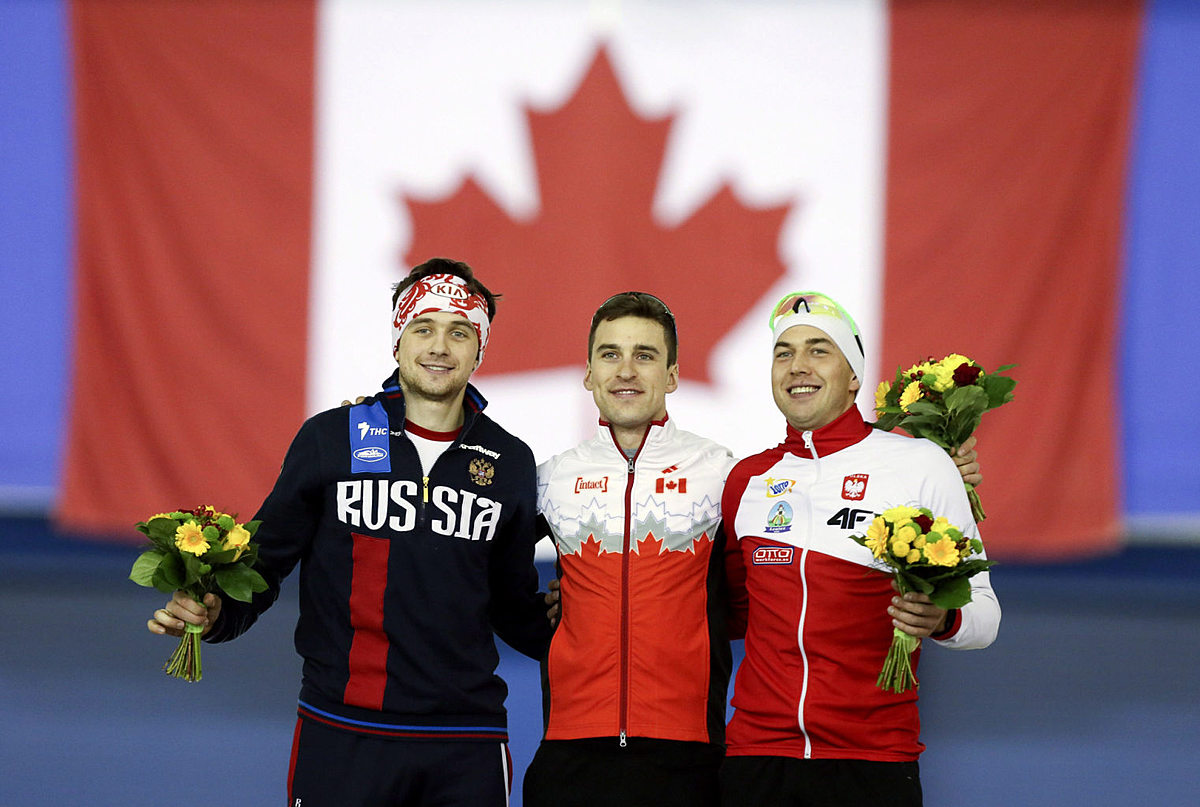 The top three in the 500 meter race Denis Yuskov, of Russia, фото (photo)