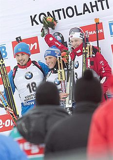 Kontiolahti (Finland), 08/03/2015.- Victorious Lesser Erik (C) of Germany is flanked by second-placed Anton Shipulin (L) of Russia and third-placed...