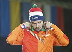 Конькобежный спорт Knegt of Netherlands celebrates during victory ceremony for men фото (photo)