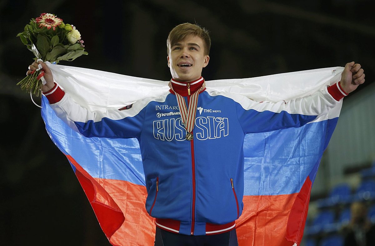 Gold medallist Elistratov of Russia celebrates during victory фото (photo)