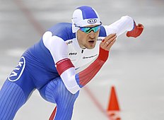 Конькобежный спорт Denis Yuskov, of Russia, competes to win the men's 500m фото (photo)