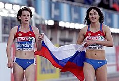 Легкая атлетика Легкая атлетика в России: Yelena Arzhakova of Russia celebrates фото (photo)