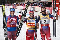 Лыжи Norway's Martin Johnsrud Sundby, center, celebrates winning фото (photo)