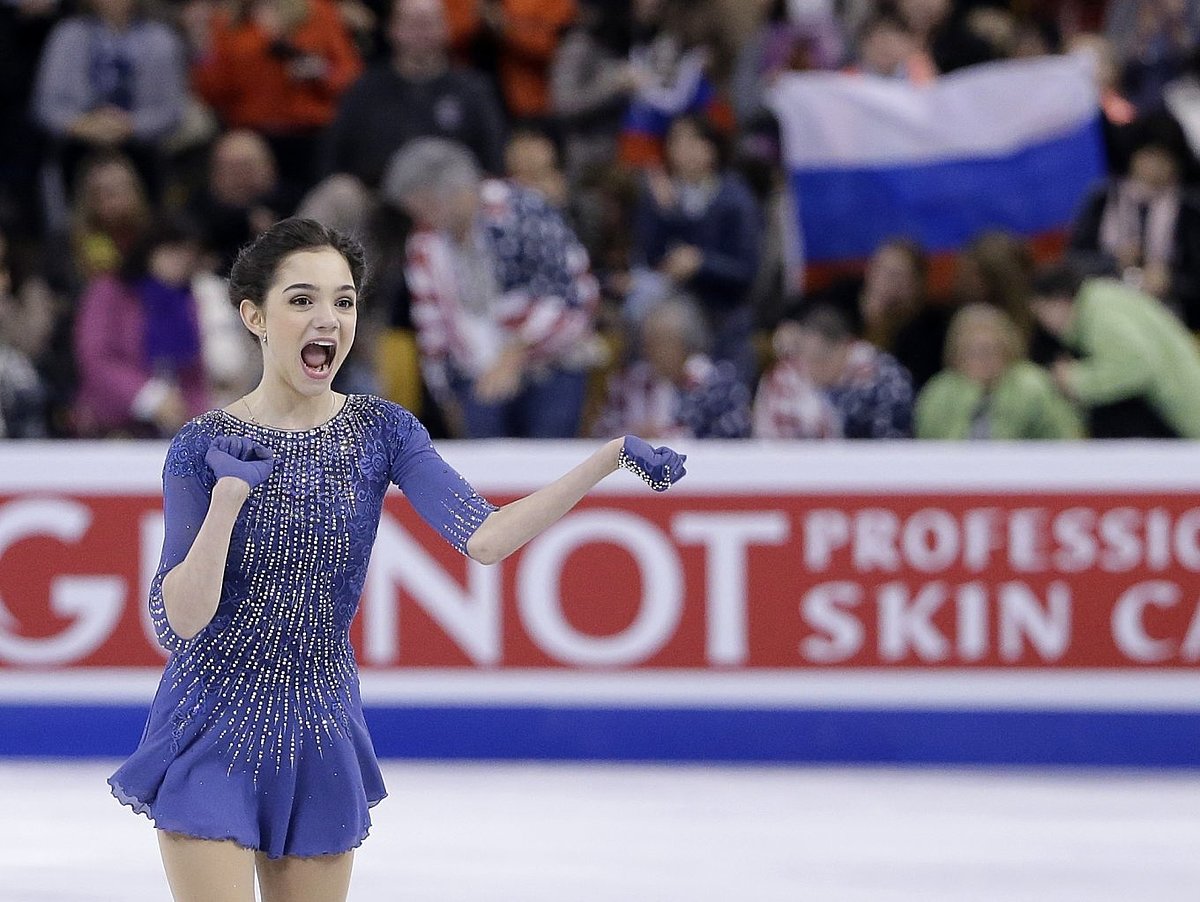Evgenia Medvedeva, of Russia, competes during the free skate фото (photo)