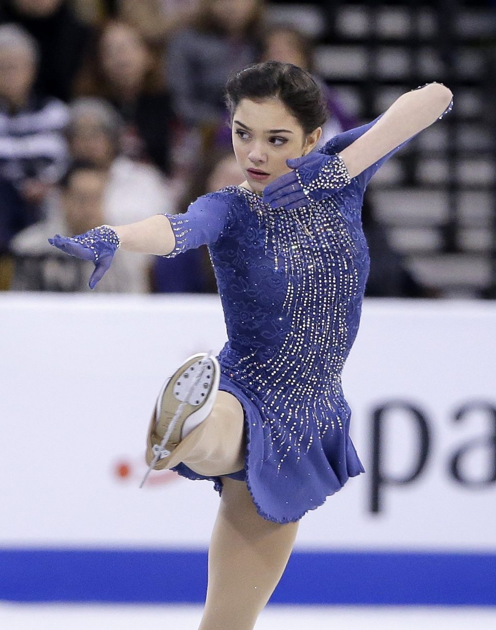 Evgenia Medvedeva, of Russia, competes during the free skate фото (photo)