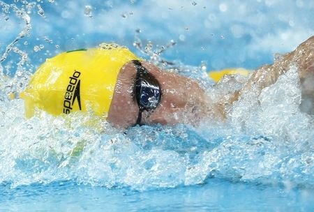 Australia's Mcevoy swims in a men's 200m freestyle фото (photo)