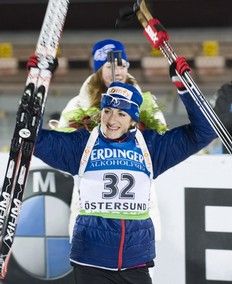 France's Marie-Laure Brunet celebrates winning the second place in the Women's 15km individual Biathlon World Cup race in Oestersund on December 1, 2010. Anna-Carin Zidek won the race and Helena Ekholm won the third place.