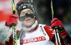 Tarjei Boe of Norway reacts after crossing the finish line in the 4th place of the men's Biathlon 20km individual race on December 2, 2010 in Oestersund, Sweden.