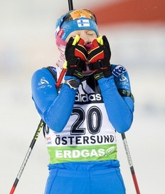Kaisa Makarainen of Finland reacts as she crosses the finish line to win first place in the women's Biathlon 7.5 km sprint race at the World Cup event on December 3, 2010 in Oestersund.