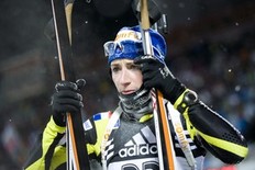 France's Marie Laure Brunet reacts after finishing 19th in the women's World Cup Biathlon 7.5 km sprint race in Oestersund on December 3, 2010.