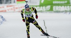 Martin Fourcade of France skis as he crosses the finish line on his way to the 3rd place during the men's Biathlon 10 km sprint race on December 4, 2010 in Oestersund. Norway's Emil Hegle Svendsen picked up his second World Cup win of the season.