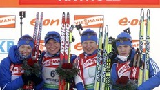 (R-L) Russia team, Svetlana Sleptsova, Anna Bogaliy Titovets, Natalia Guseva and Olga Zaitseva pose on a podium after winning the women's 4x6km relay at the Biathlon World Cup at a ski resort northeast of Italy in Anterselva January 22, 2011. Russia won the competition ahead of second-placed Sweden and third-placed Germany.