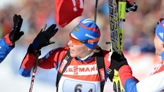 Russian Olga Zaitseva celebrates as she crosses the finish line of the Women's 4x6 km relay event of the Biathlon World Cup in Anterselva on January 22, 2011. Russia won ahead of Sweden and Germany.