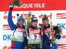 Russia's Ivan Tcherezov (L), second, France's Alexis Boeuf (C), first, and Sweden's Carl Johan Bergman, third, celebrate after the IBU World Cup Biathlon Men's 12.5 km Pursuit on February 6, 2011 in Presque Isle, Maine.