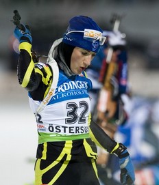 France's Marie Laura Brunet prepares for the range on her way to the 2nd place at the Women's Biathlon 15km individual race on December 1, 2010 in Oestersund, Sweden.
