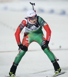 Darya Domracheva of Belarus crosses the finish line as the 3rd place during the women's Biathlon 7.5 km sprint race on December 3, 2010 in Oestersund, Sweden.