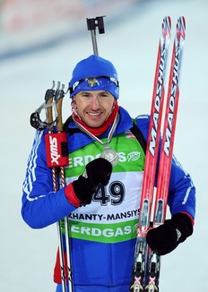 Maxim Maksimov of Russia poses with his silver medal after placing second on March 8, 2011 in the men's individual 20 km Biathlon World Championships race in the Siberian city of Khanty-Mansiysk.