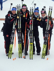 Germany's team members (L-R) Magdalena Neuner, Tina Bachmann, Miriam Gossner and Andrea Henkel pose with their gold medals after the Women's 4x6 km relay event of the Biathlon World Championships in the Siberian city of Khanty-Mansiysk on March 13, 2011.