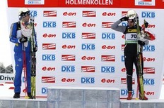 Second-placed Bjorn Ferry of Sweden (L) stands on the podium with third-placed Alexander Wolf of Germany after competing in the Biathlon 10 km sprint men's event in Holmenkollen Ski Arena March 17, 2011. Winner Andreas Birnbacher of Germany left immediately after the race due to personal reasons.