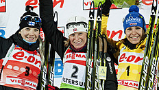 Norway's Tora Berger (C) Stands On The Podium With Second-placed Finland's Kaisa Makaraine...