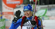 OSTERSUND, SWEDEN - DECEMBER 02: Anna Carin Olofsson-Zidek of Sweden celebrates after her second place in the Women's 15 km Individual event of the E.ON Ruhrgas IBU Biathlon World Cup on December 2, 2009 in Ostersund, Sweden.