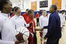 Баскетбол U.S. President Barack Obama (R) greets (L-R) Tamika Catchings фото