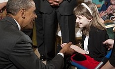Баскетбол US President Barack Obama greets 11-year-old Haley Klepper during фото