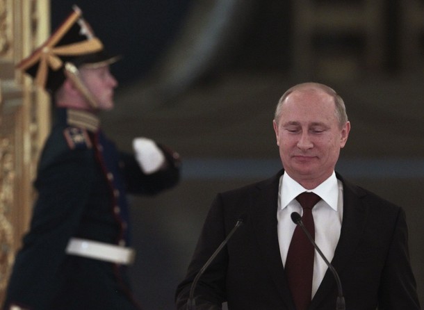 Russian President Vladimir Putin arrives at an awards ceremony фото