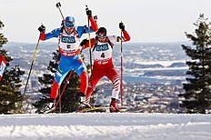 Биатлон Alexandr Loginov of Russia and Dominik Landertinger of Austria фото (photo)